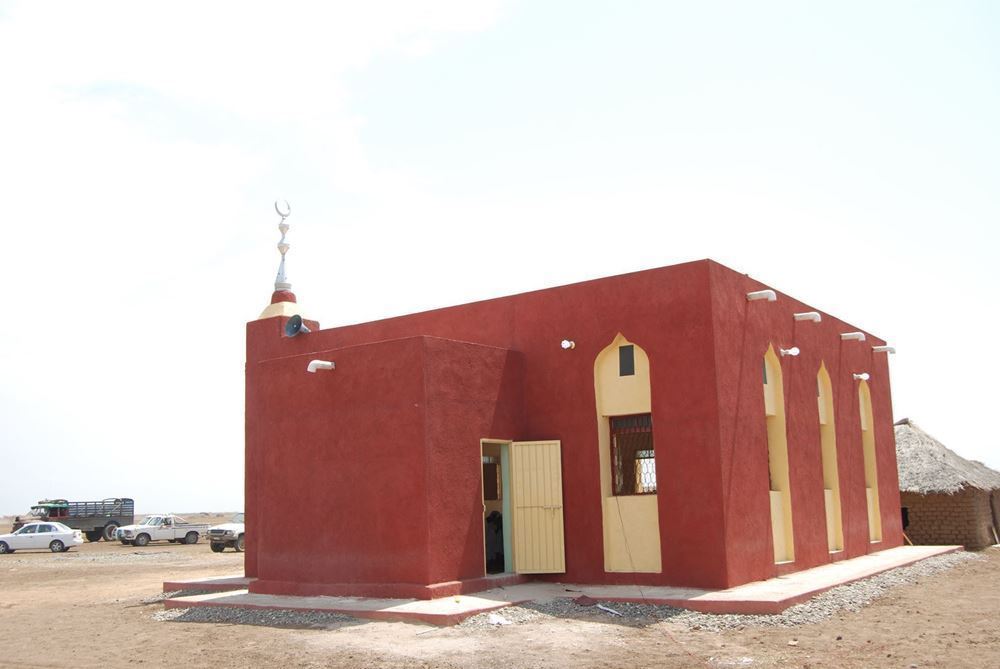 Picture of A 100-meter mosque compliments the concrete ceiling with a minaret, a lighthouse, and two toilets, in addition to the mosque's furniture - Sudan - Kassala | 08/2021