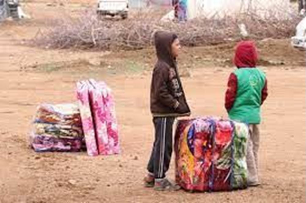 Providing winter blankets for orphans Lebanon International Charity