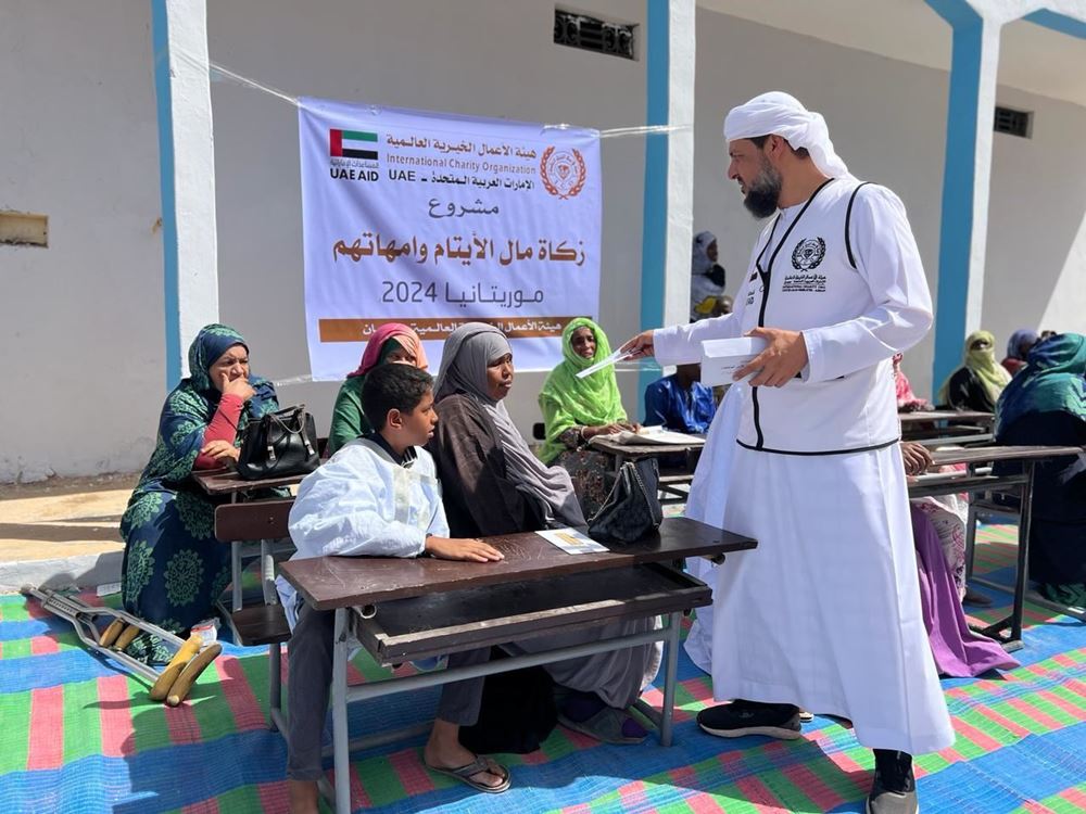Picture of Distributing zakat money to orphans and their families