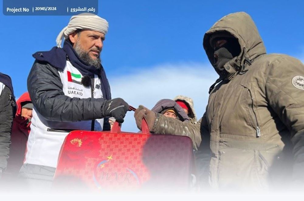 صورة توزيع بطانيات على الأسر الفقيرة