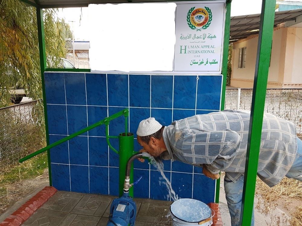 صورة بئر سطحي مزود بمضخة كهربائية