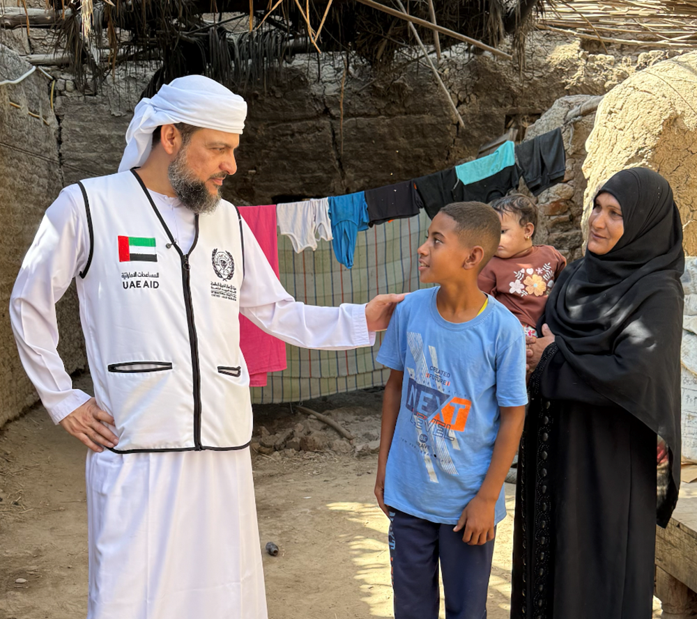 Picture of A widow needs to build a house and support her two children.