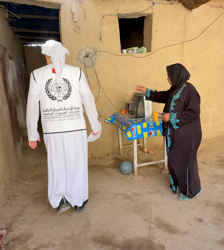 Picture of A widow needs to build a house and support her two children.