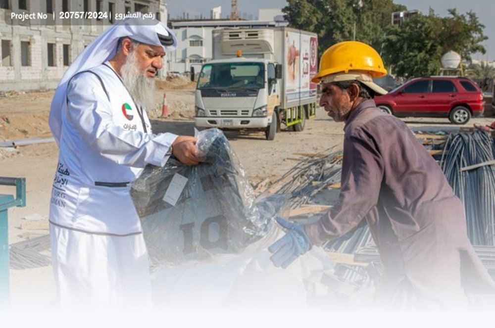 صورة مستلزمات شتاء لعمال وأسر محتاجة