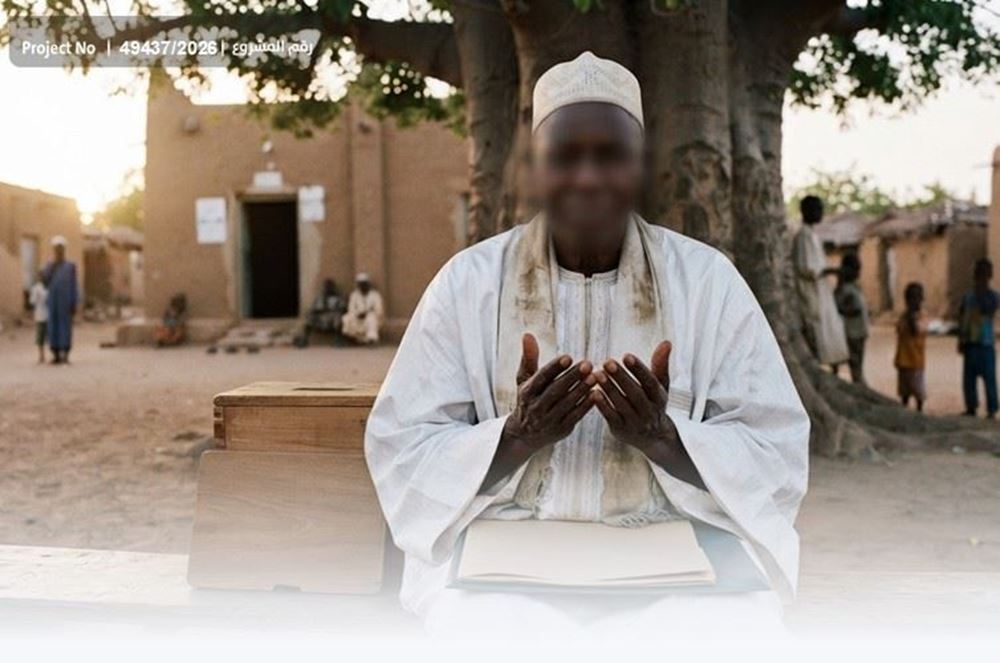 Picture of Elderly man and mosque imam appeals to benefactors.